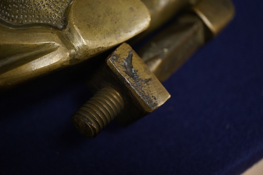 An early 20th century bronze ‘dolphin’ door knocker, 20cm